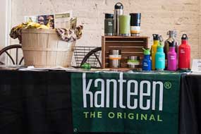 A table with our merch, including Klean Kanteen and more!